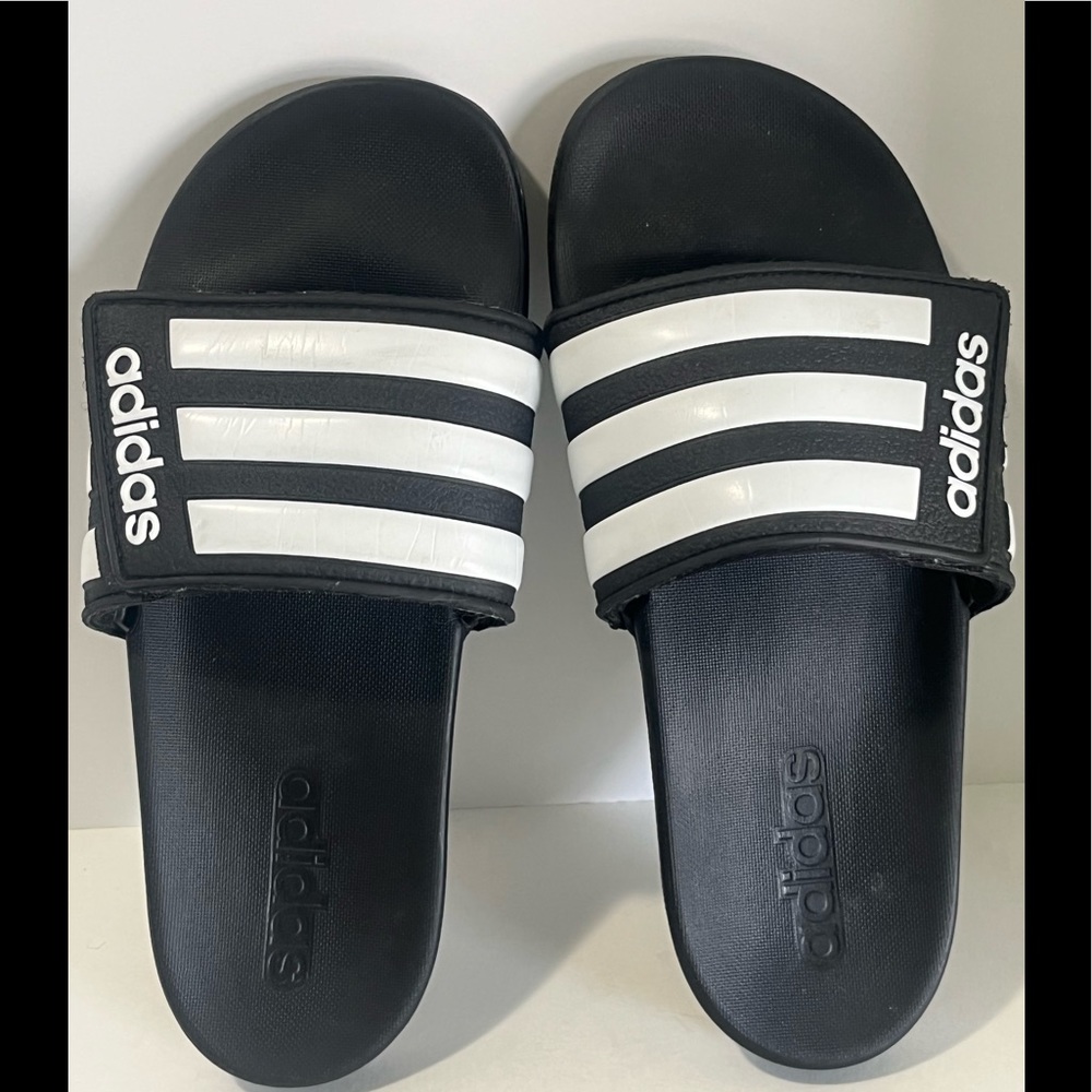 Adidas ADILETTE COMFORT ADJUSTABLE SLIDES with velcro closure.